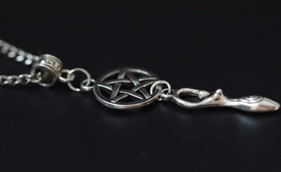 Pentagram & Fertility Goddess Necklace - aleph-zero