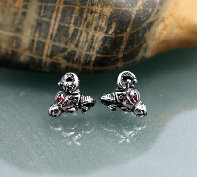 Goat head titanium steel earrings