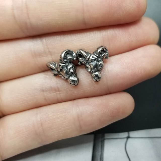 Goat head titanium steel earrings